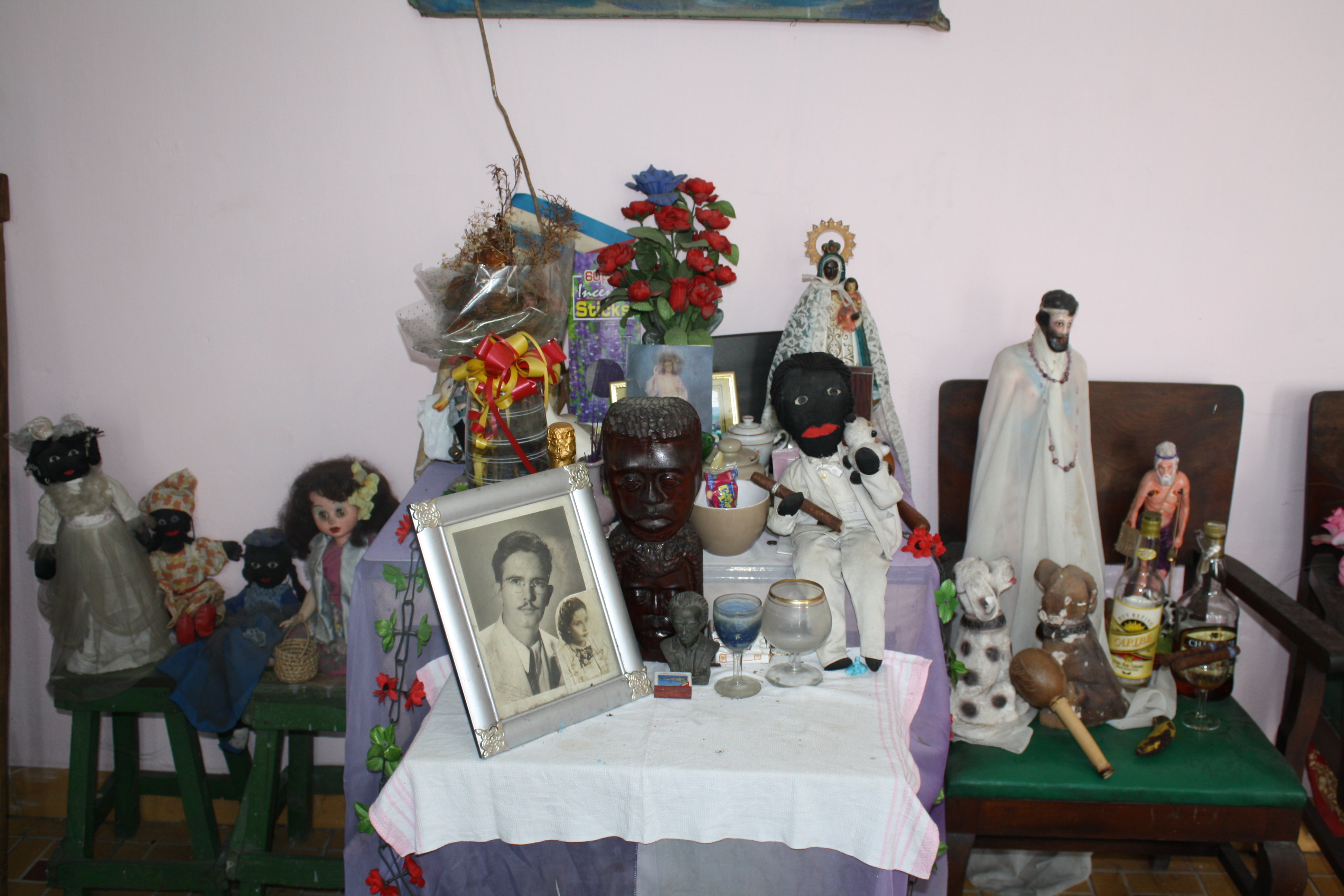 Figure 19. Most of Mirta’s Spiritist bóveda in her living room, Santiago de Cuba, August 2011. Photograph by author.